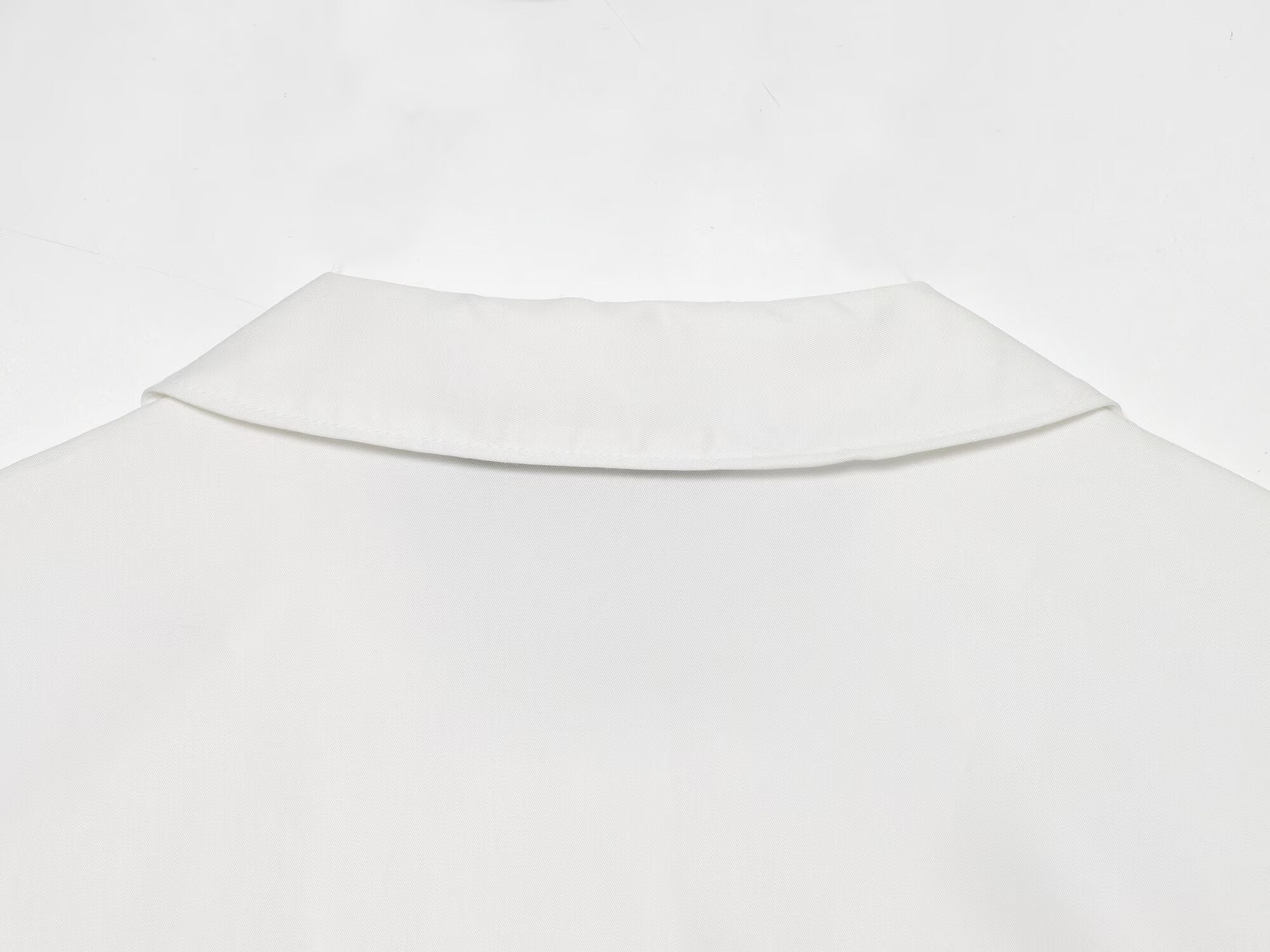 Women's breasted decorative sleeveless lapel top