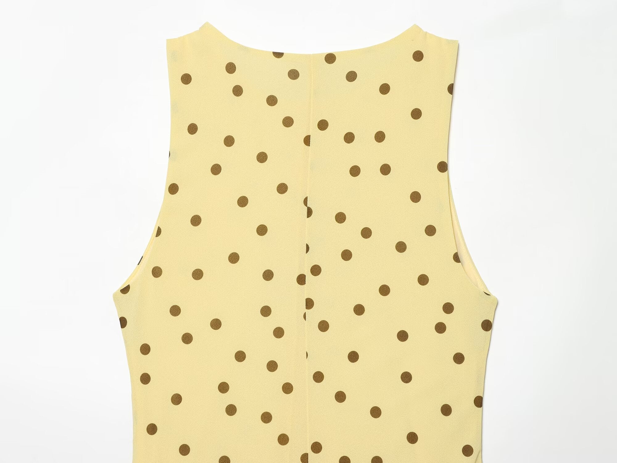 Women's sleeveless polka dot draped dress