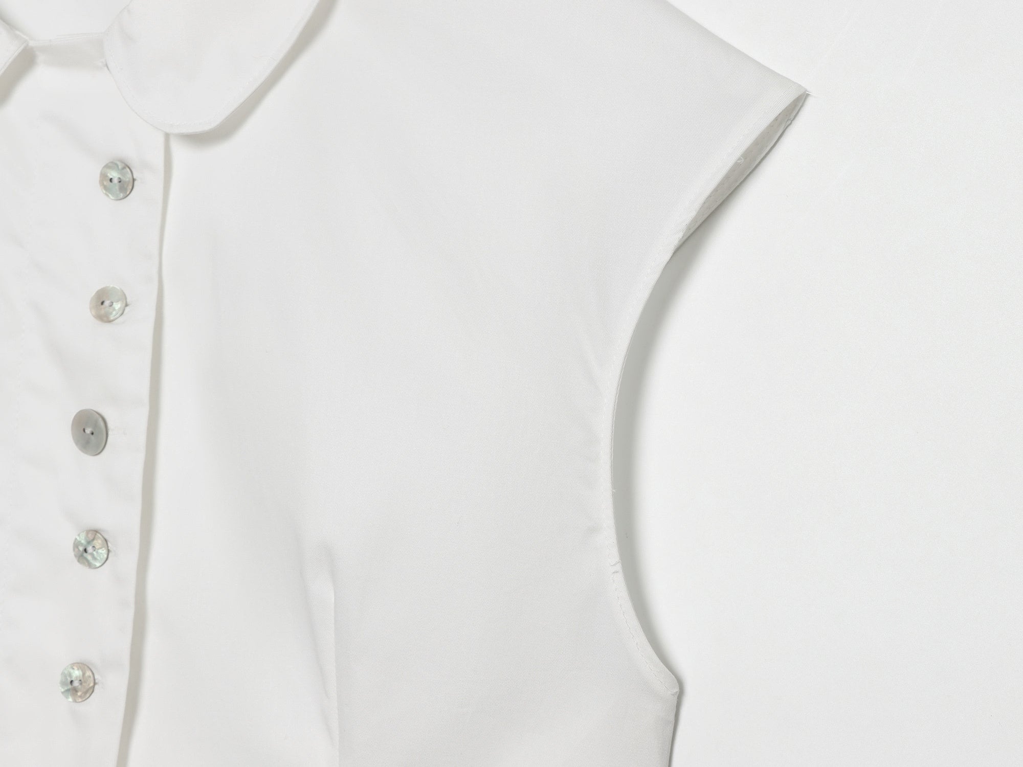 Women's breasted decorative sleeveless lapel top